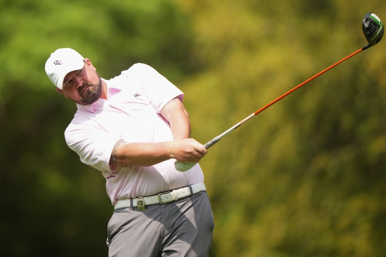Michael Strain hits his shot from the 16th tee during the first round of the 54th PGA Professional Championship